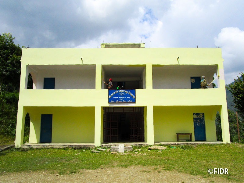 Creating environments where children are motivated to learn - repairing school buildings and preparing desks first -