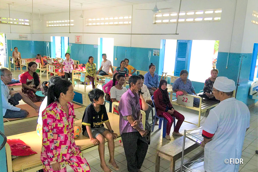 A hospital nurse shared the appropriate hand washing way with soap to patients in Kratie Provincial Referral Hospital.